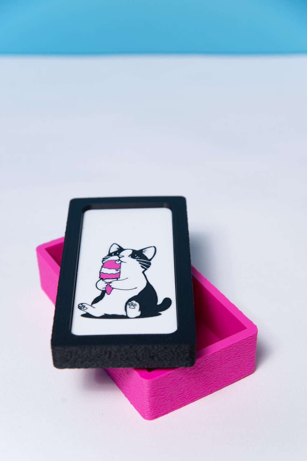 Cute cat storage box shown from a side angle
